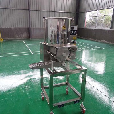 機械を電気にしている小型ポテトのビーフのハンバーガー ハンバーグ